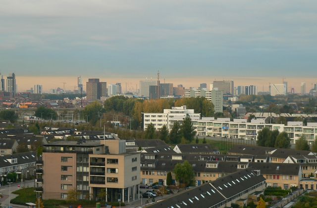 View of the Rotterdam skyline across the water seen from Capelle aan den IJssel