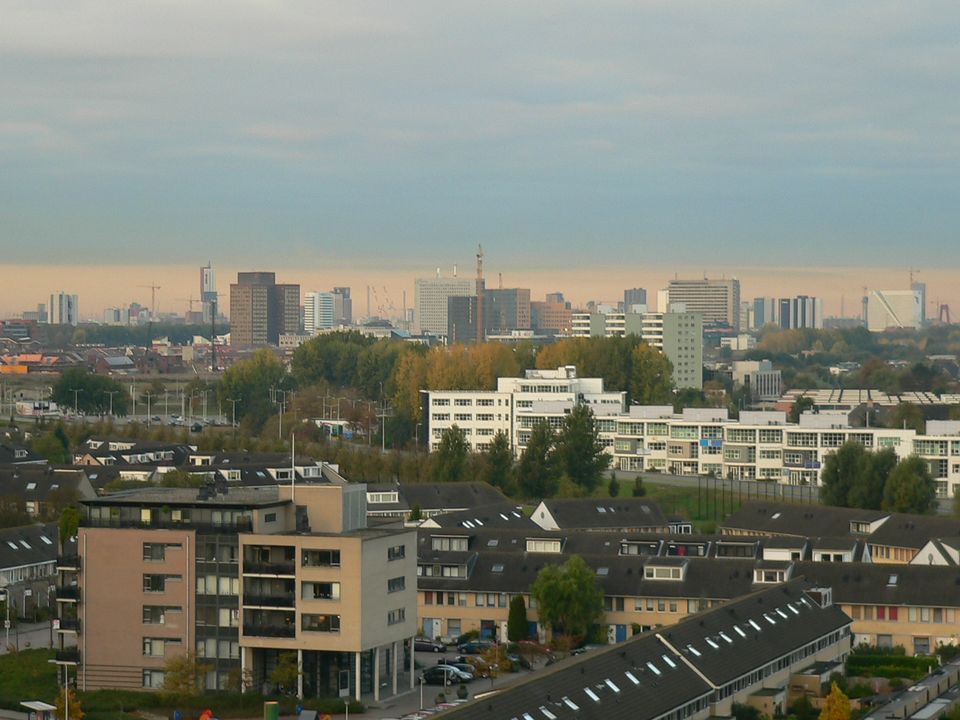View of the Rotterdam skyline across the water seen from Capelle aan den IJssel