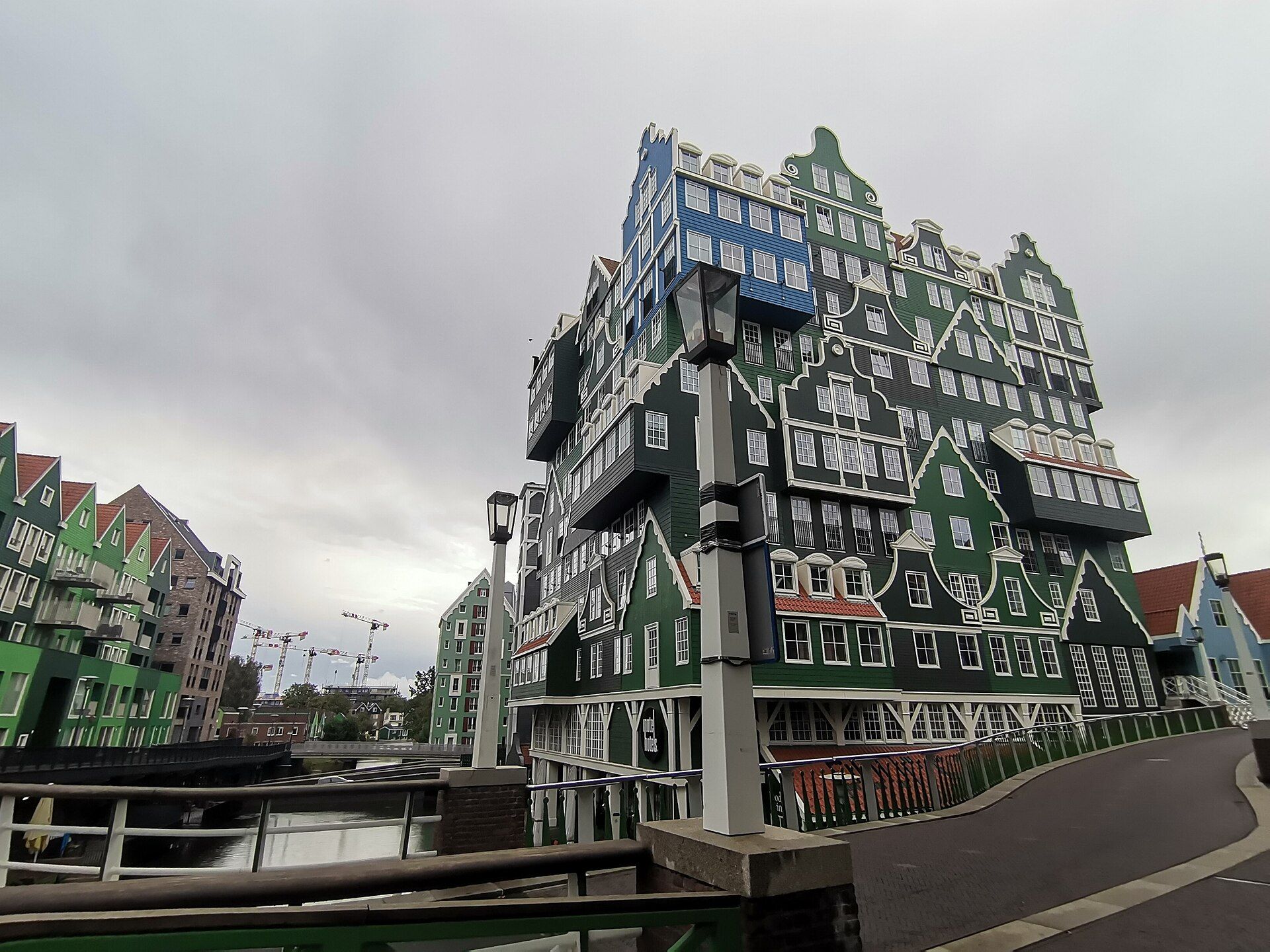 The stacked green Zaanse house facades of the Inntel hotel beside Zaandam station, the centrepiece of the Inverdan city centre rebuild