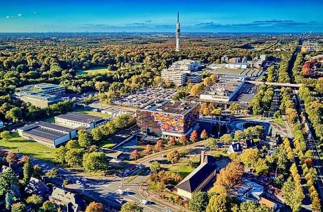 Aerial view of the Media Park broadcasting complex surrounded by trees in Hilversum
