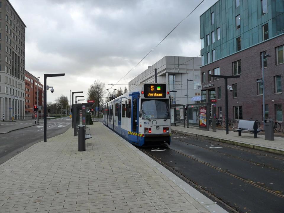 Tram arriving at the Stadshart stop in central Amstelveen on a clear day
