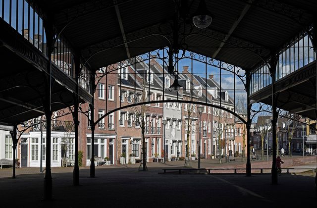 Brick gabled houses around De Plaetse square in Brandevoort, the new-build district of Helmond