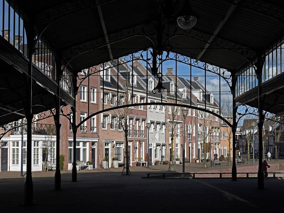 Brick gabled houses around De Plaetse square in Brandevoort, the new-build district of Helmond
