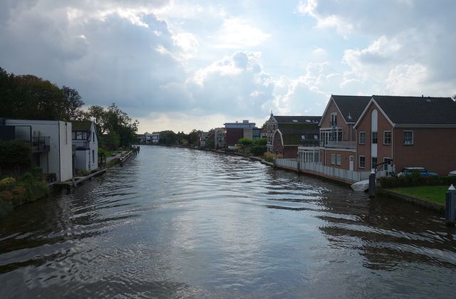 The Oude Rijn river running through Alphen aan den Rijn with buildings along both banks