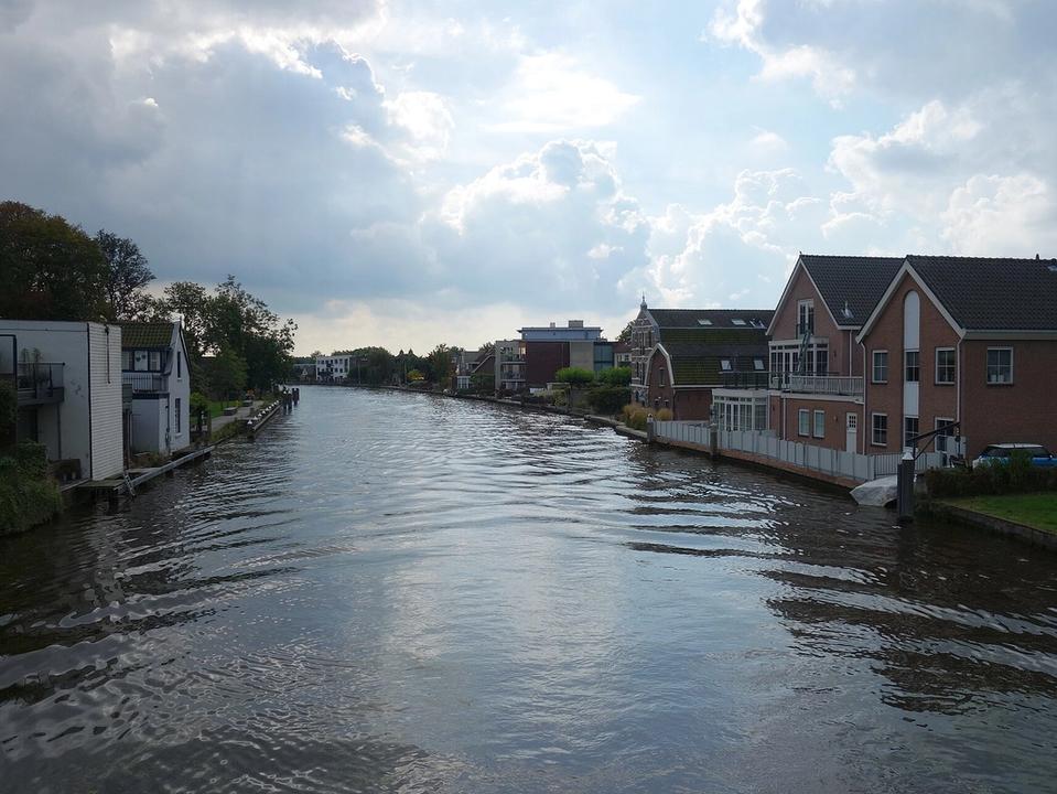 The Oude Rijn river running through Alphen aan den Rijn with buildings along both banks