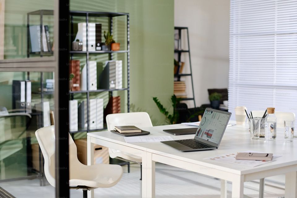 Home closing documents organized in folders on a desk