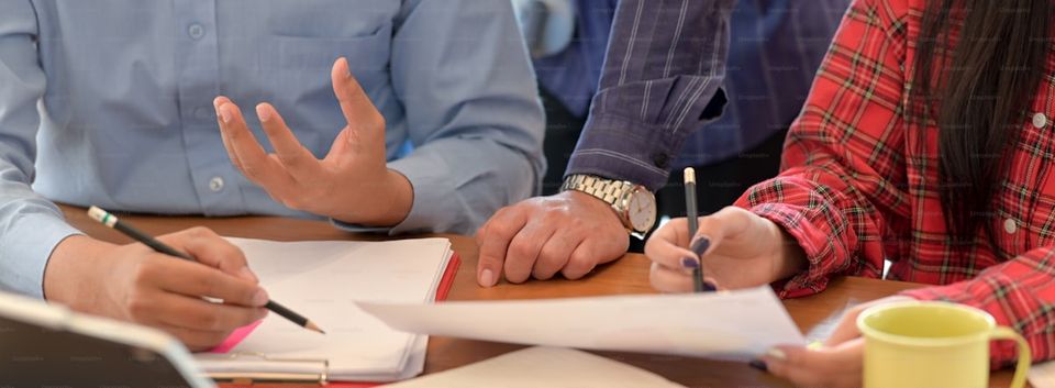 Homeowner reviewing insurance policy declarations page and home inventory records