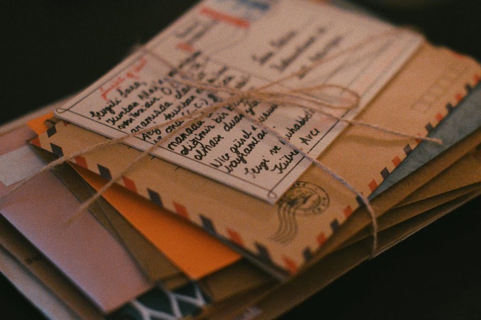 New homeowner organizing closing documents in labeled folders