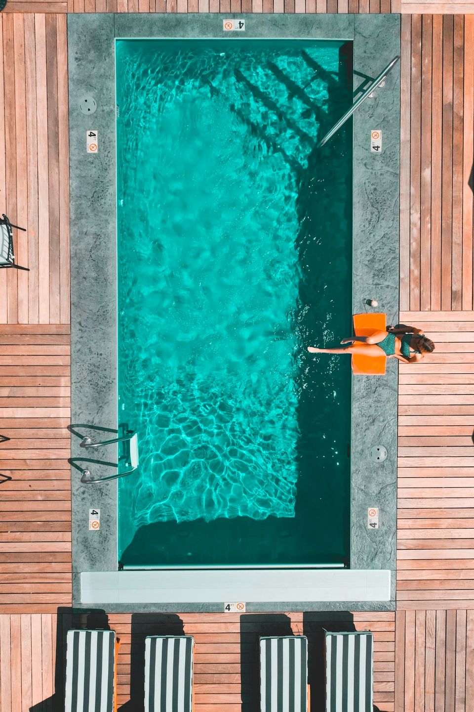 Pool maintenance record showing weekly chemical readings and monthly equipment service entries