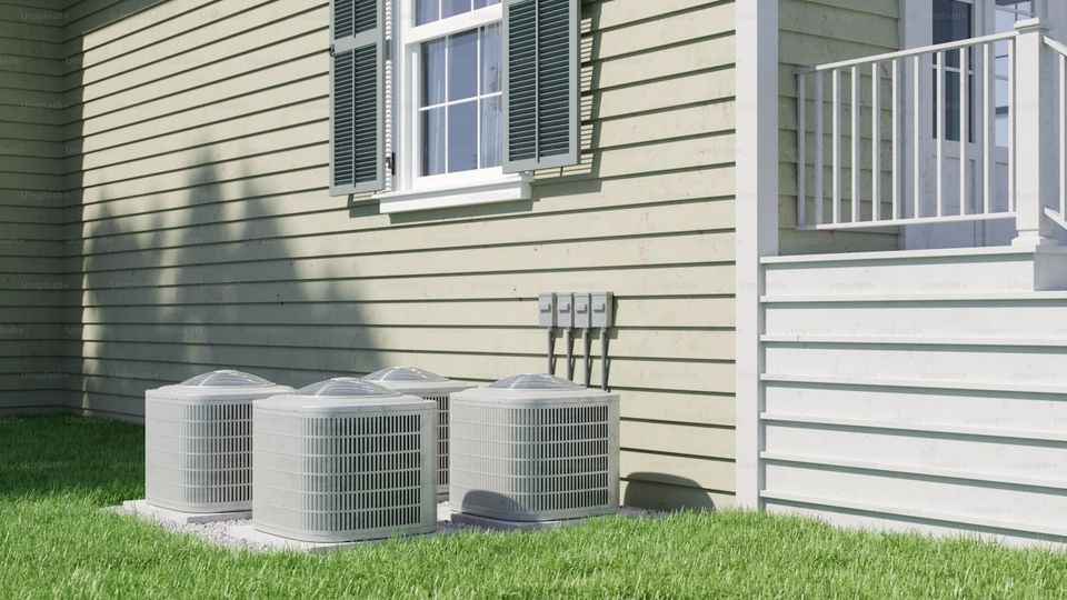 Home inspector checking HVAC system during pre-listing inspection