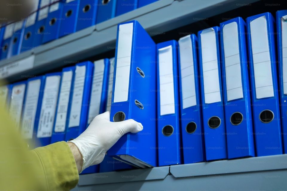 Home maintenance records organized in labeled folders