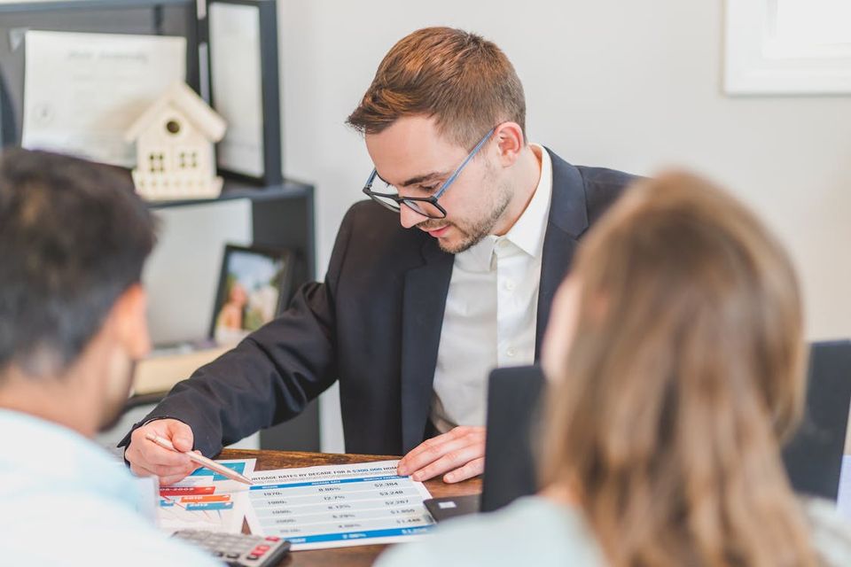 Real estate agent&#39;s listing presentation highlighting documented property history as a selling point