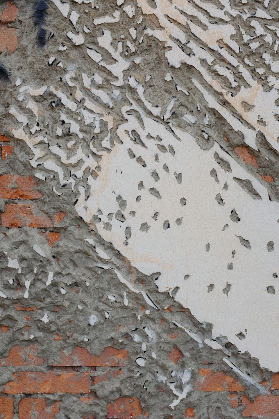 Warning signs of foundation damage including horizontal wall crack, sticking door frame, and wall-ceiling separation