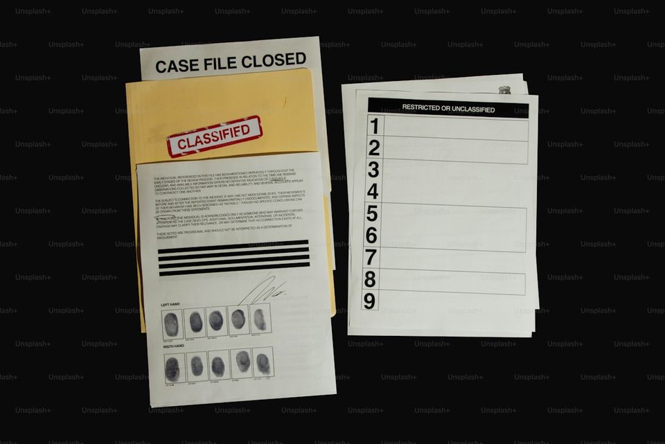 Collection of home warranty cards, receipts, and registration confirmations ready to be digitized