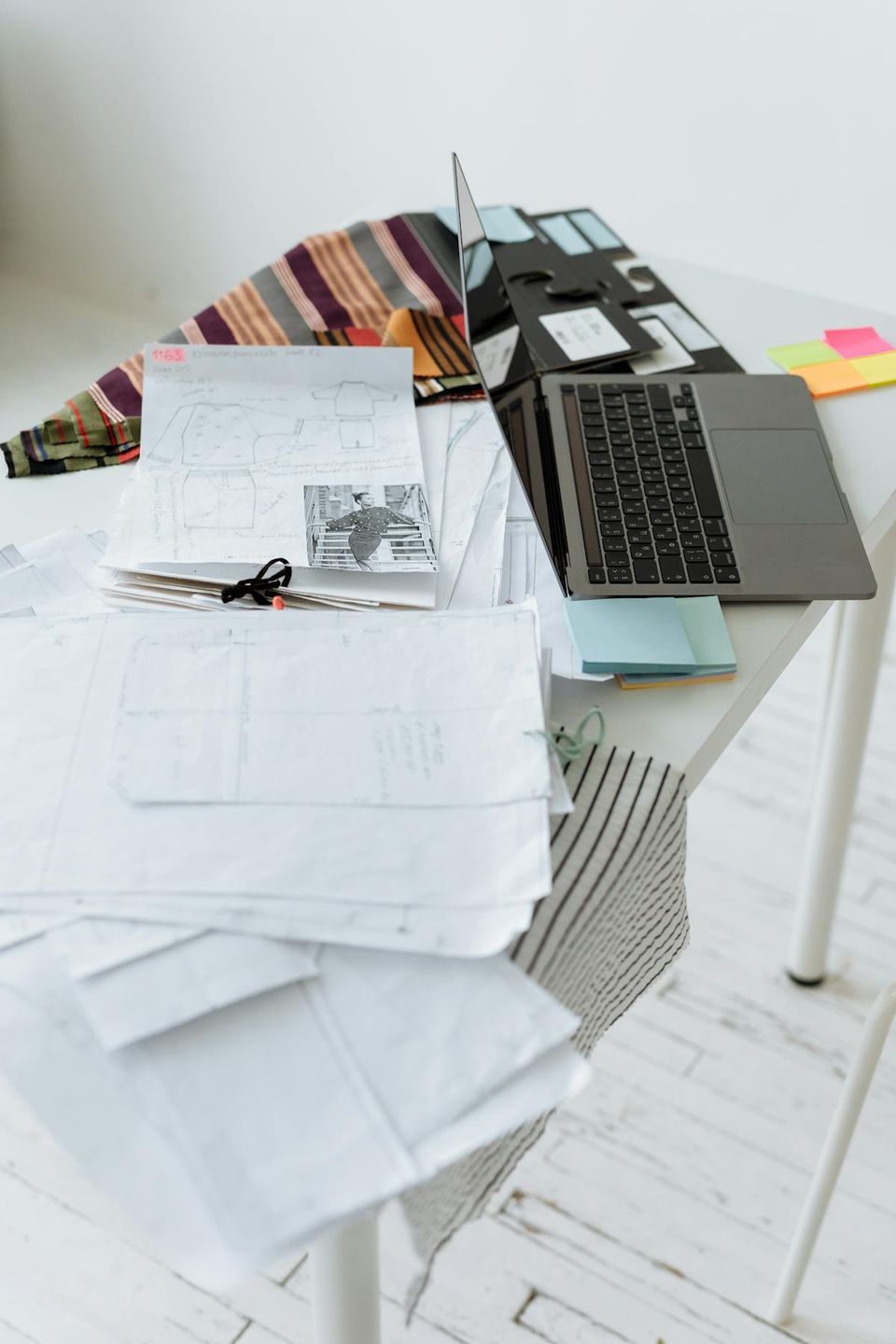 Side-by-side comparison of paper filing cabinet versus organized digital document management for rental properties