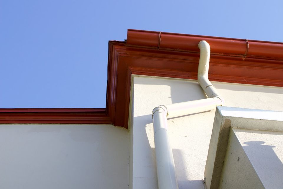 Gutter maintenance log showing biannual cleaning entries with condition notes and repair flags