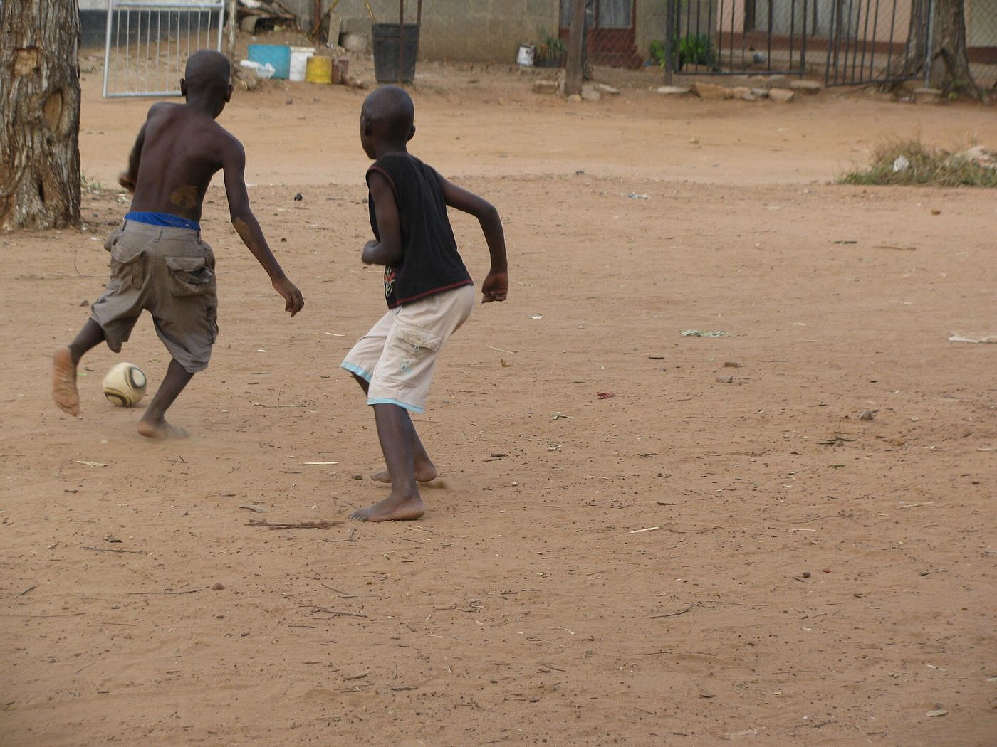 Children playing street football, the spirit of community tournaments in Nairobi