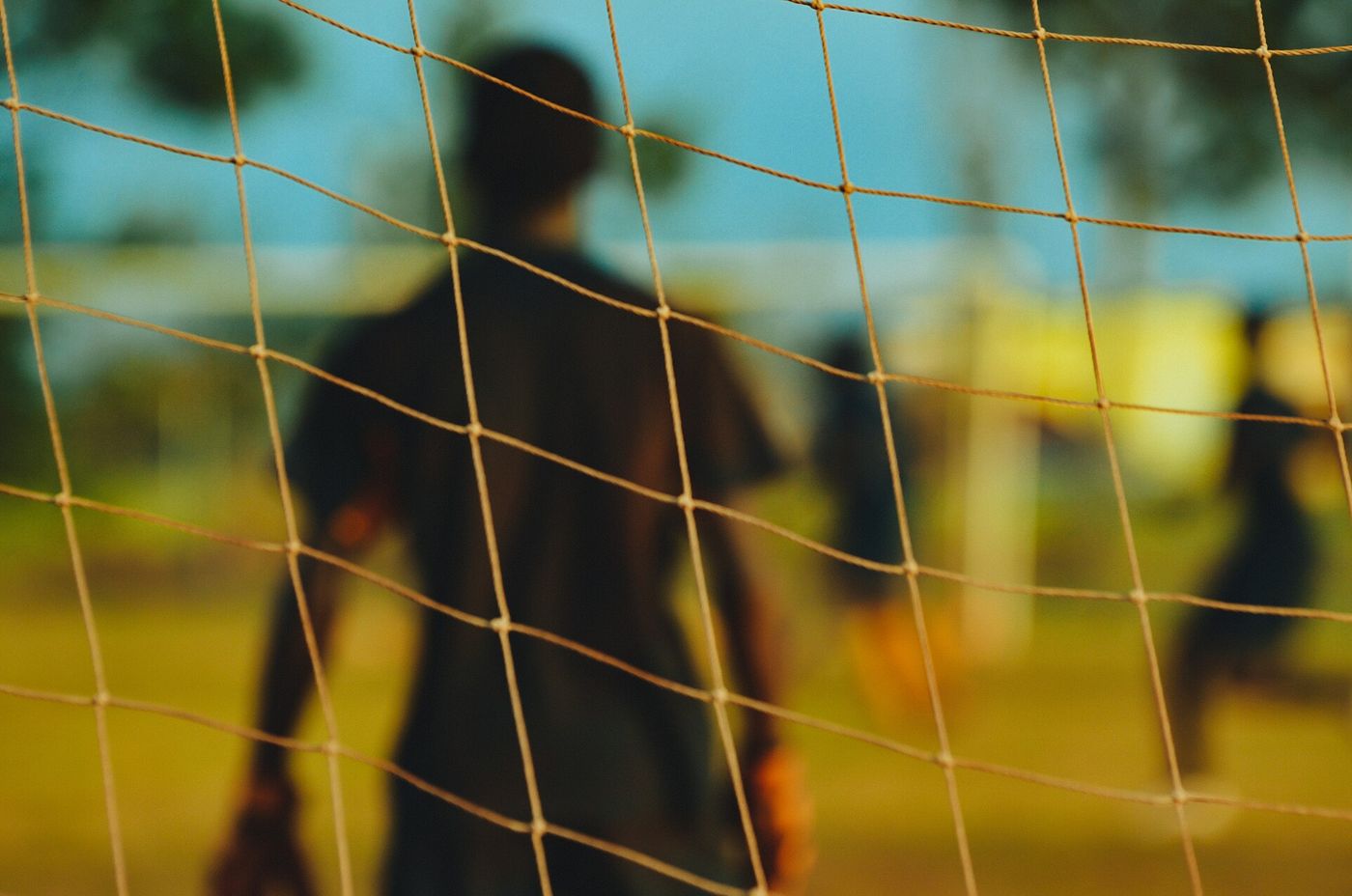 Goalkeeper seen through the goal net, illustrating the 2026/27 Kenyan Premier League rules