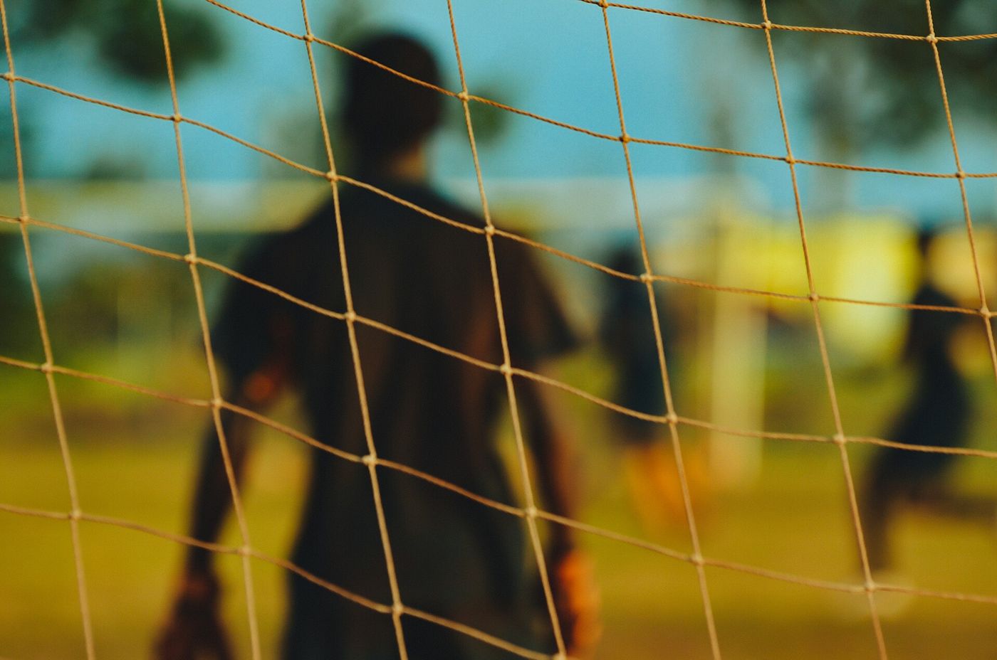 Goalkeeper seen through the goal net, illustrating the 2026/27 Kenyan Premier League rules