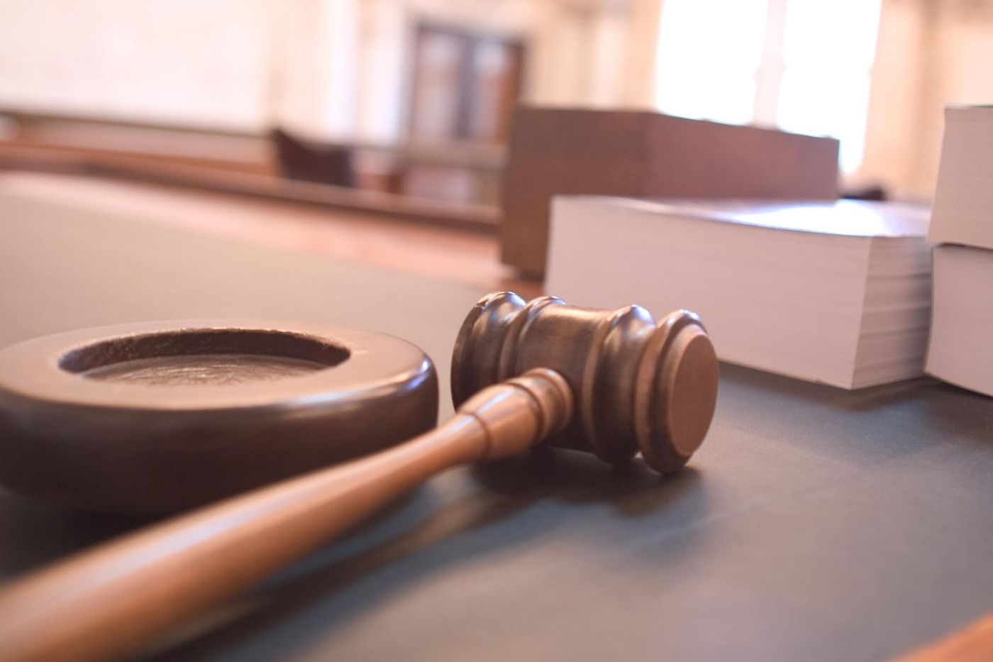 A judge's gavel in a courtroom, illustrating the FKF court cases