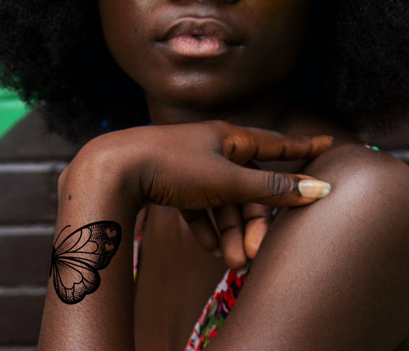 butterfly wing tattoo on wrist