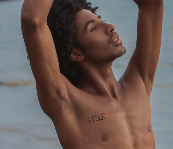 love tattoo on chest