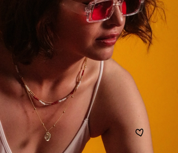 heart tattoo on arm
