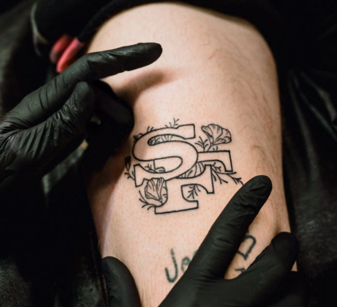 SF temporary tattoo custom design on leg man ephemeral