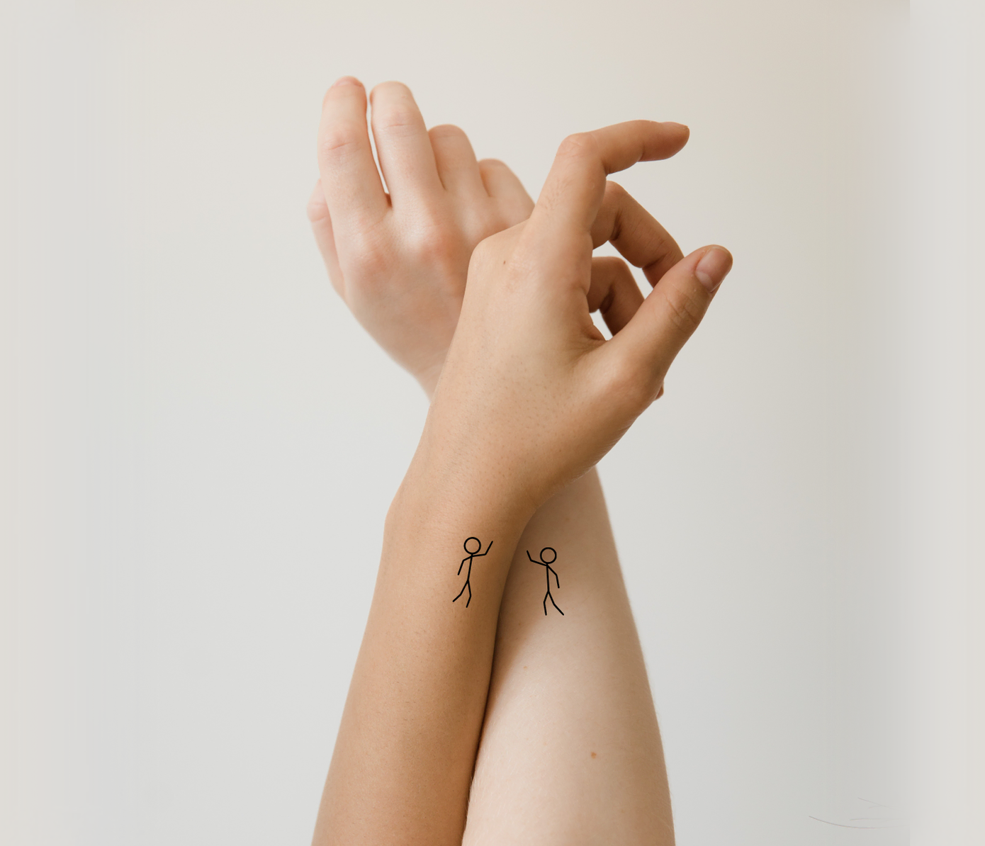high five matching tattoos