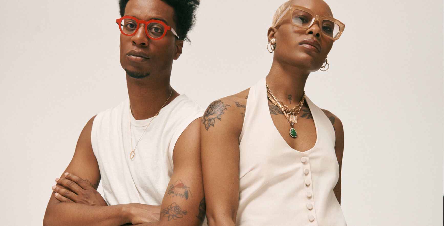 two friends with made-to-fade temporary tattoos