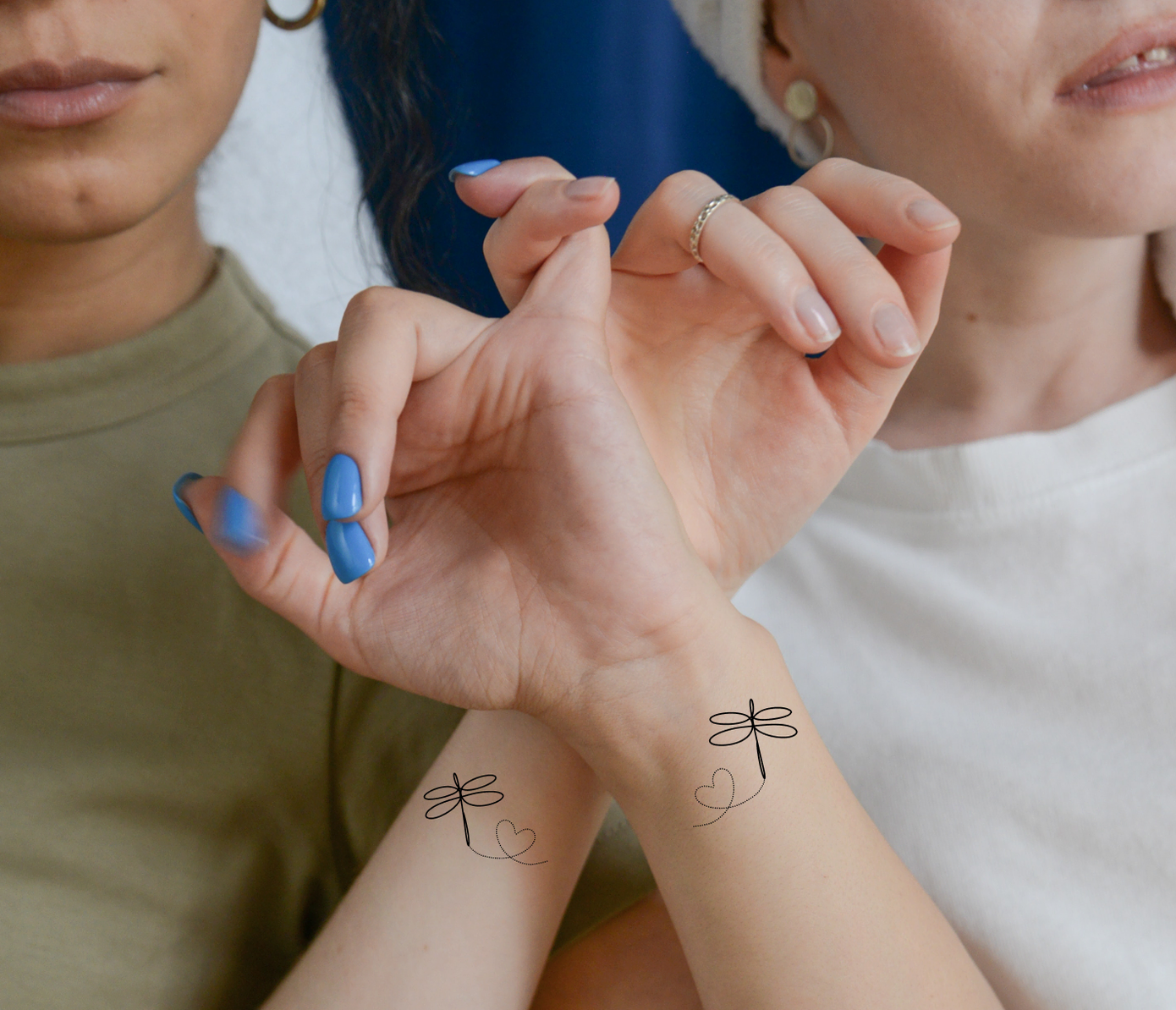 swirly dragonflies matching tattoos