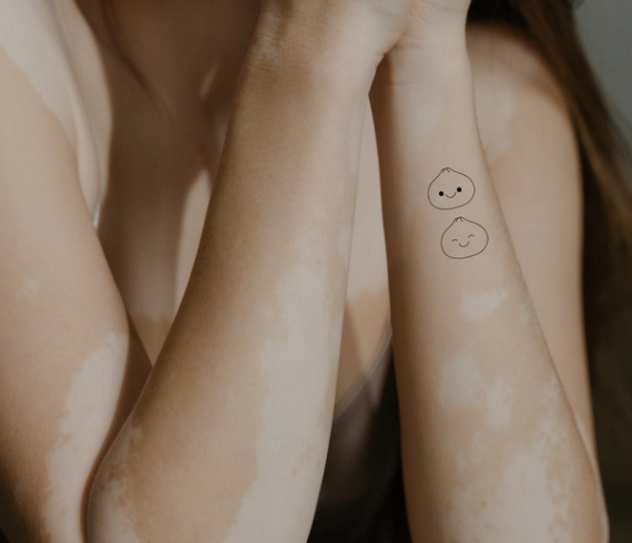 dumpling tattoos on arm