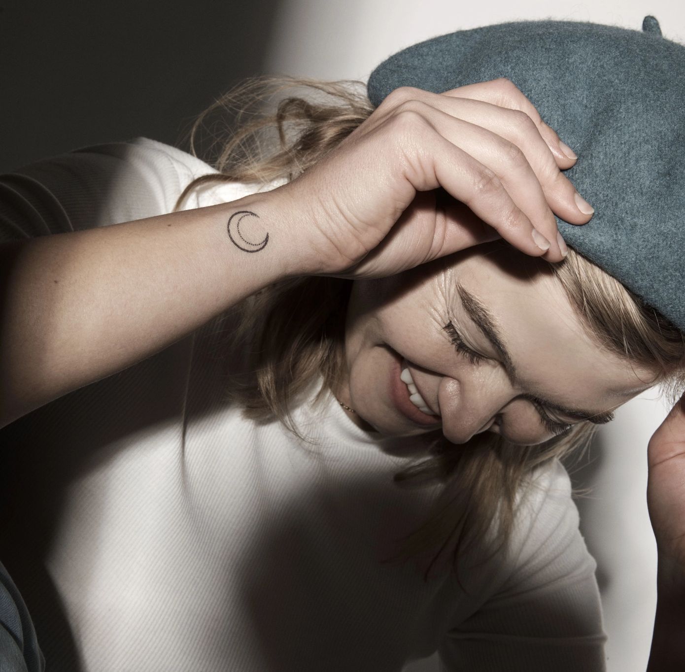 girl with moon tattoo on wrist simple idea
