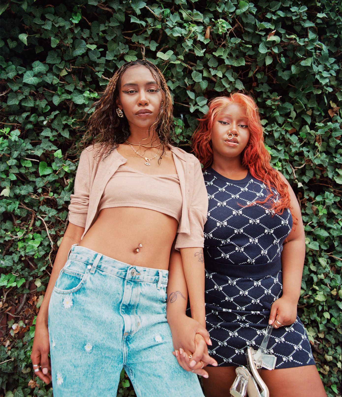 two sisters with their ephemeral temporary tattoos