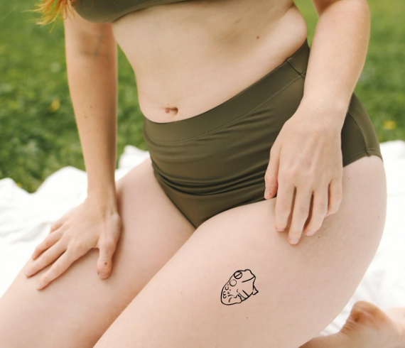 frog tattoo on leg