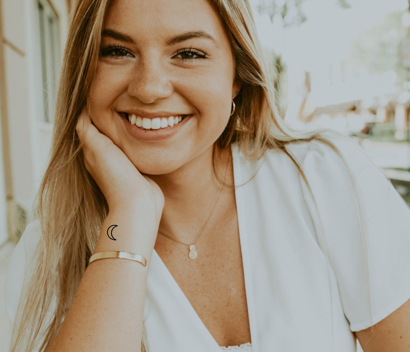 moon tattoo on wrist