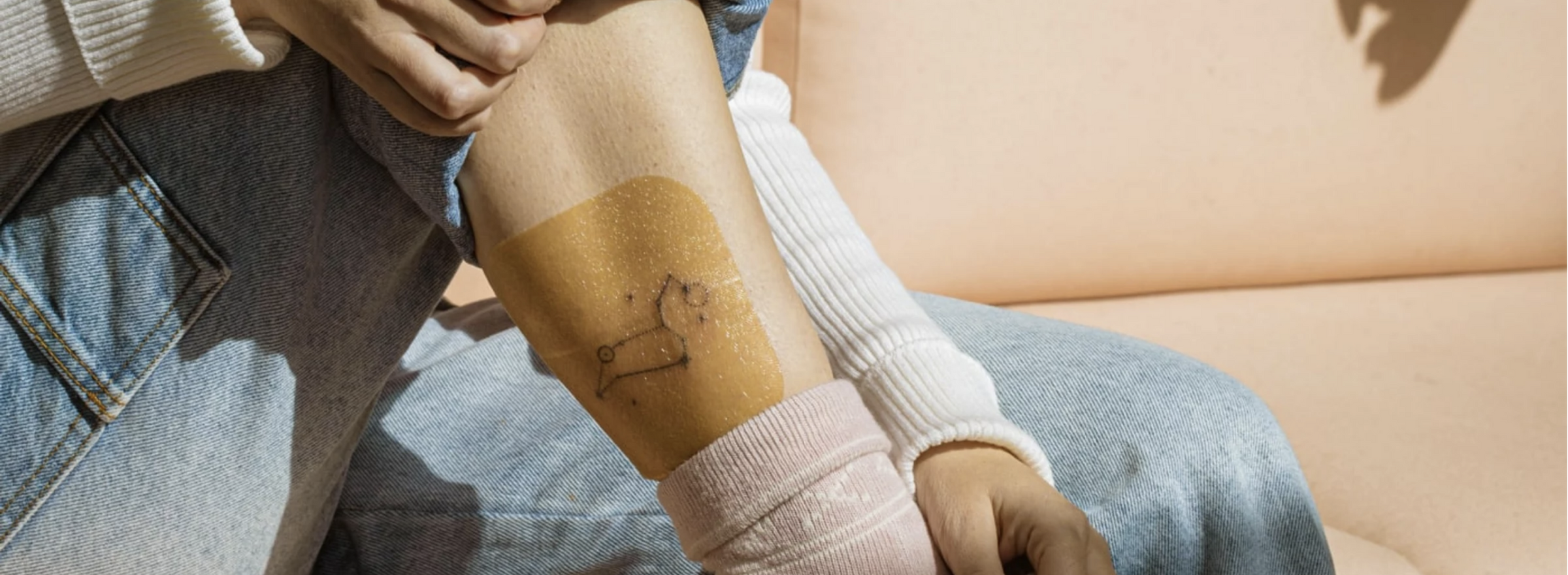 Ephemeral tattoo studio artist giving a temporary tattoo