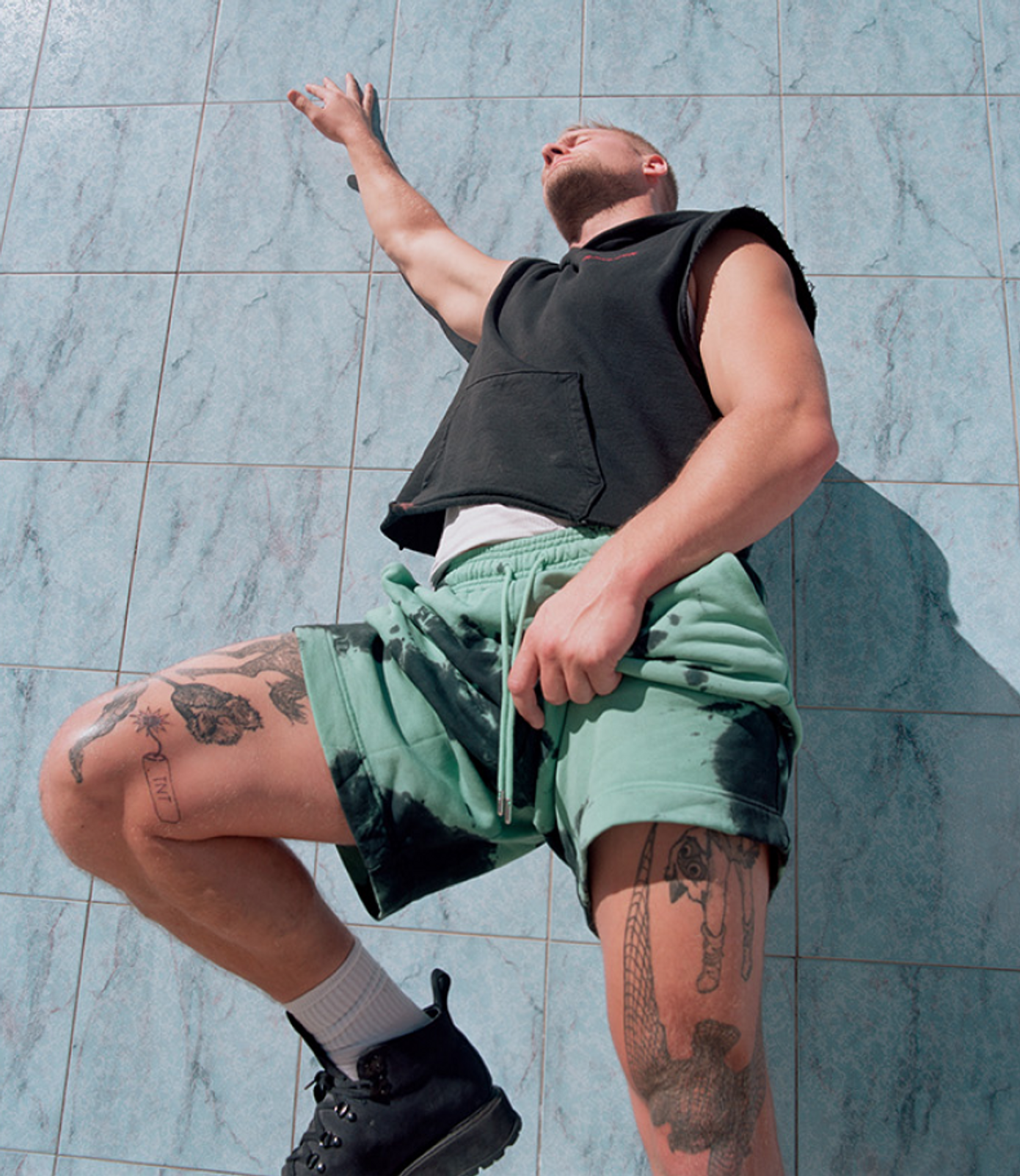 abe with ephemeral custom temporary tattoos on his leg