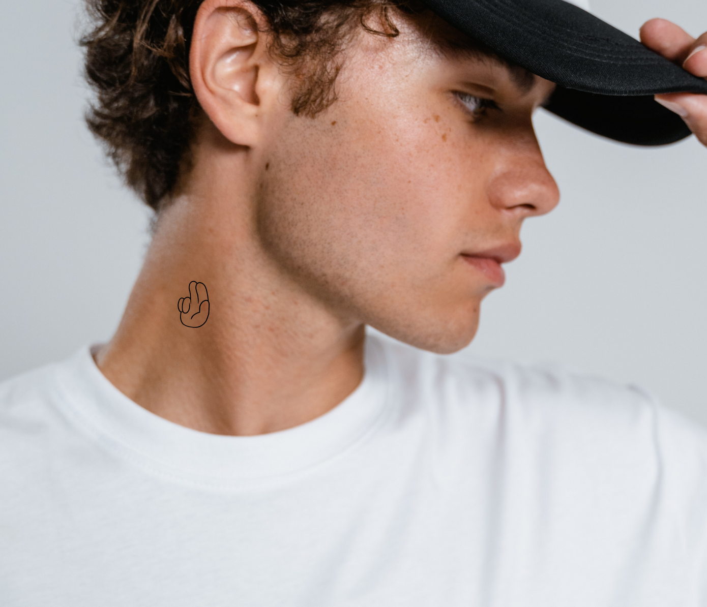 bless symbol tattoo on neck
