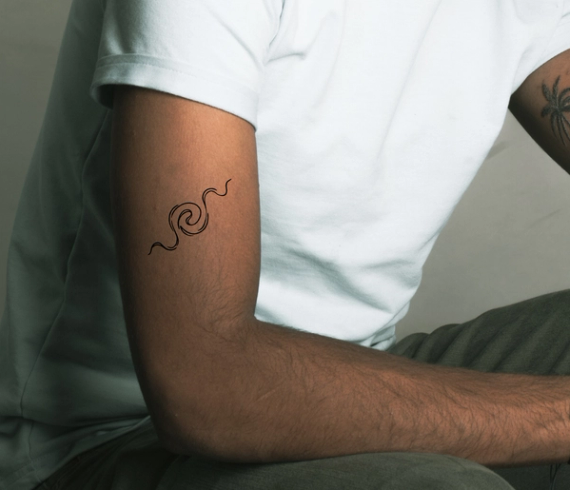 ripple tattoo on arm