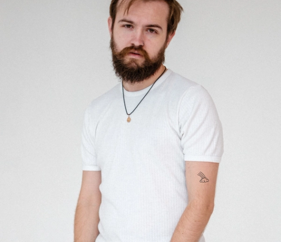 rainbow tattoo on arm