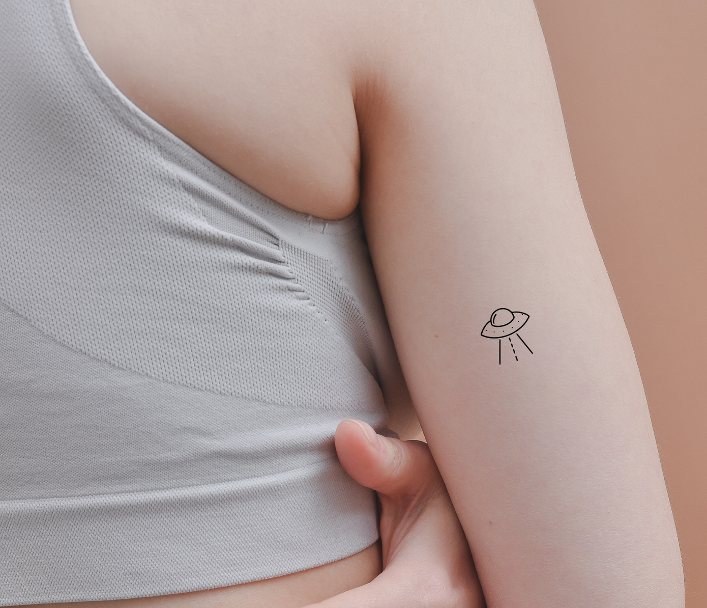 ufo tattoo on arm