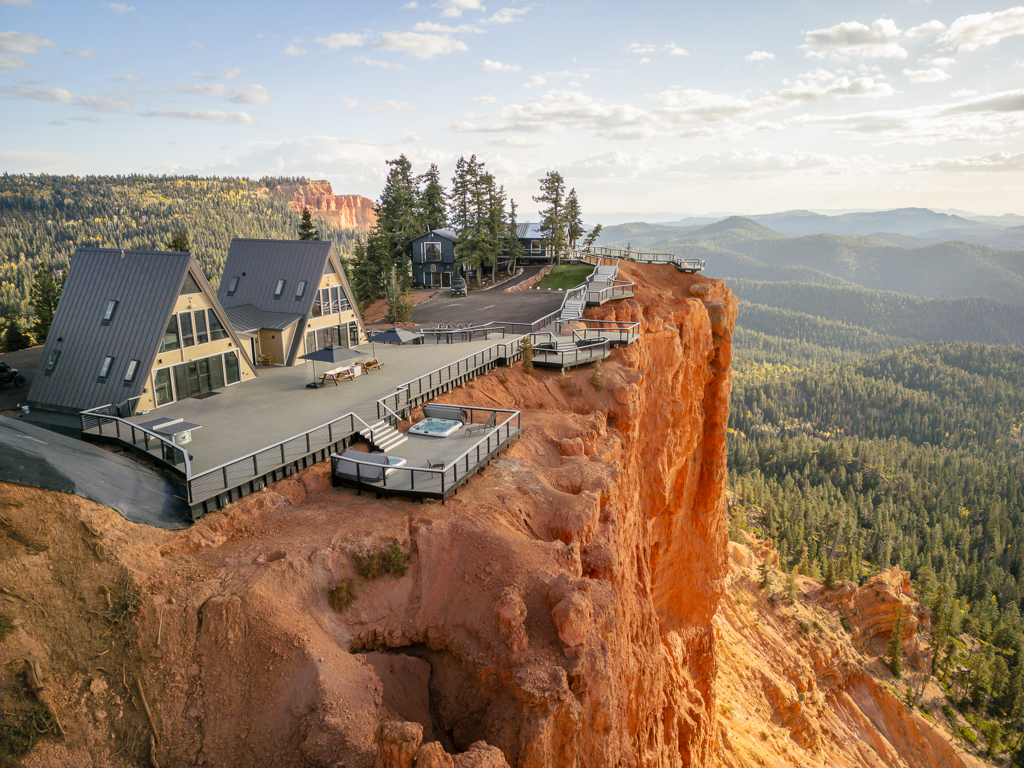 Double A-frame house on a mountain