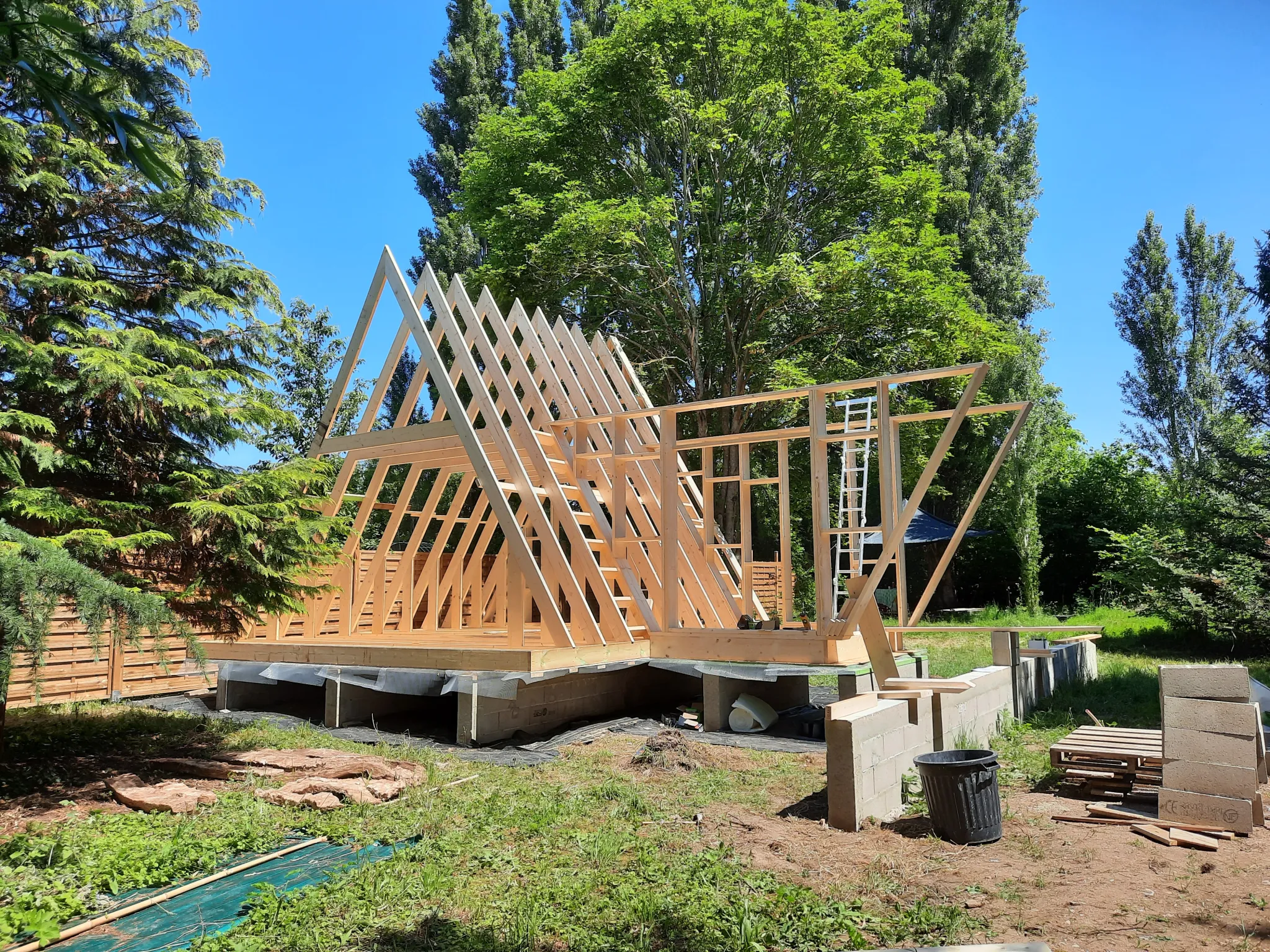 Construction site for double A-frame connected with a gallery