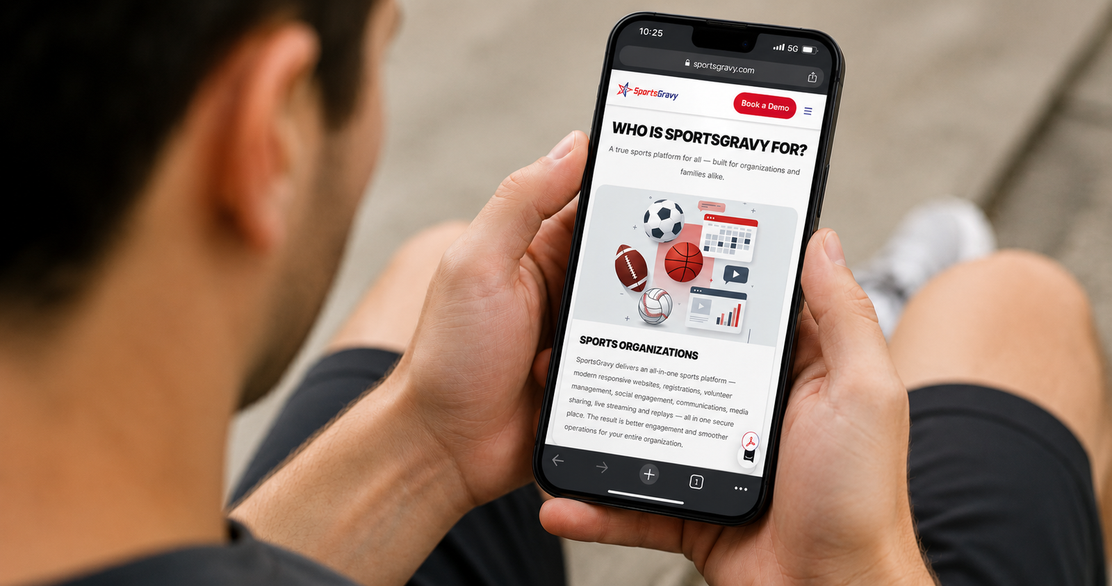 Person hold phone reading about sportsgravy.