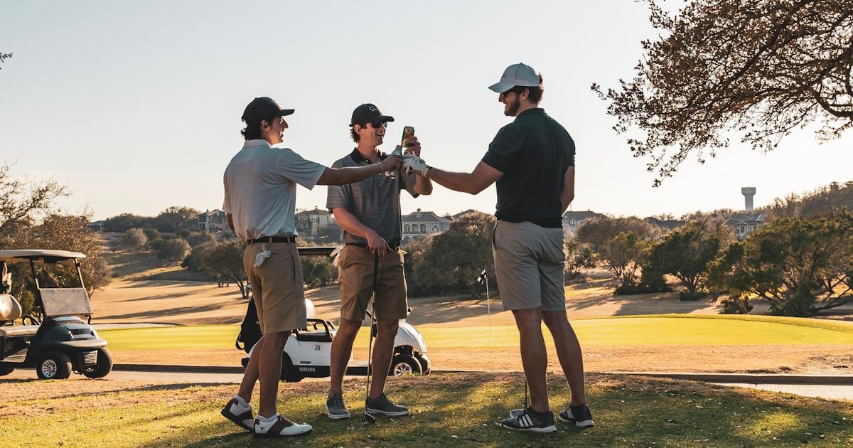 Young golfer competing on the course during a college tournament