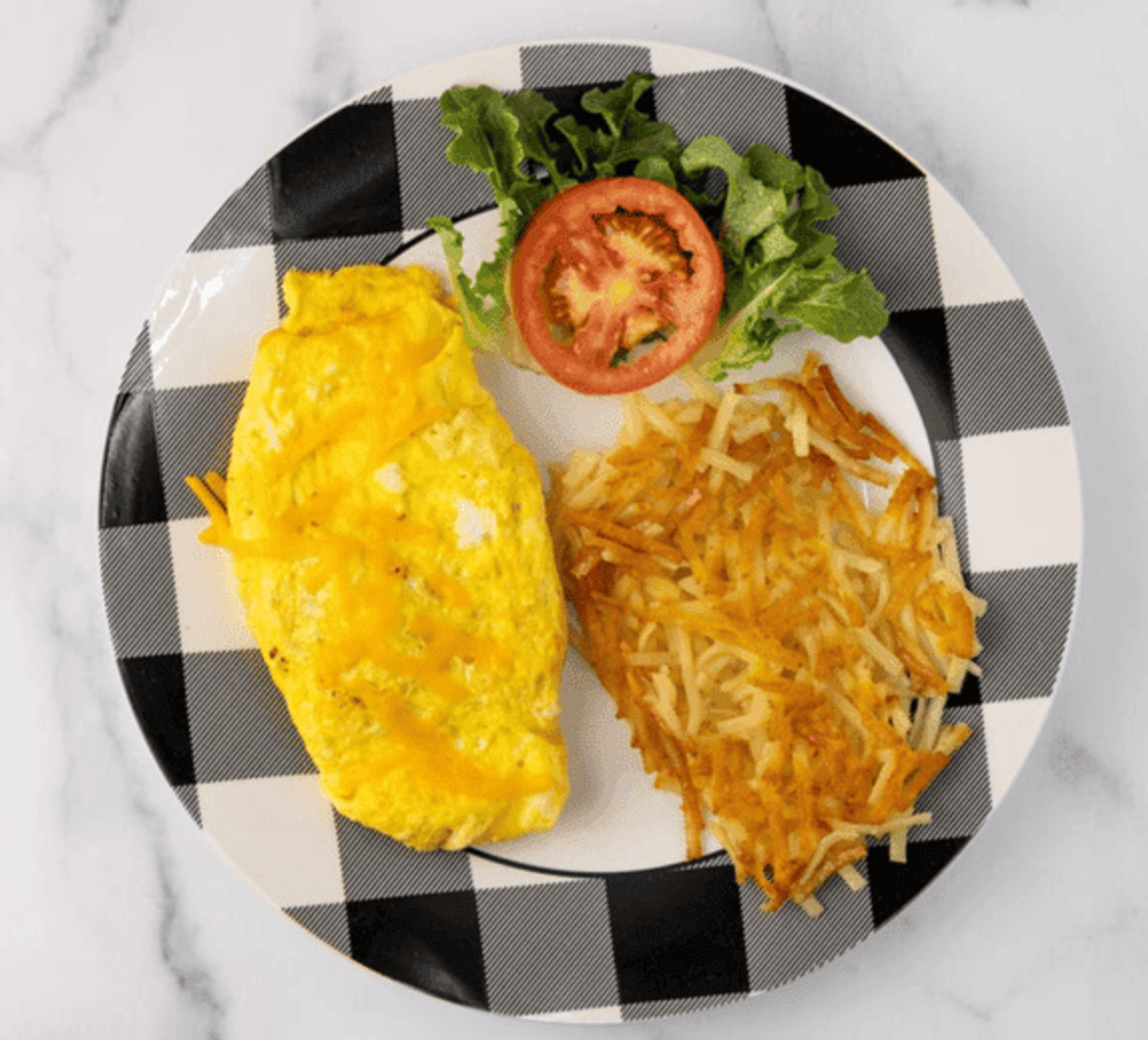 Zion Delight cheese omelette with hash browns — breakfast Atlanta