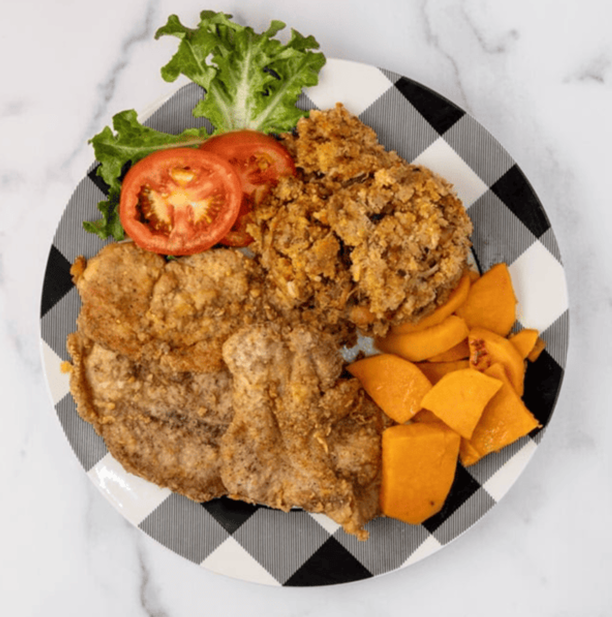 Zion Delight fried pork chop plate with candied yams and stuffing — Atlanta soul food