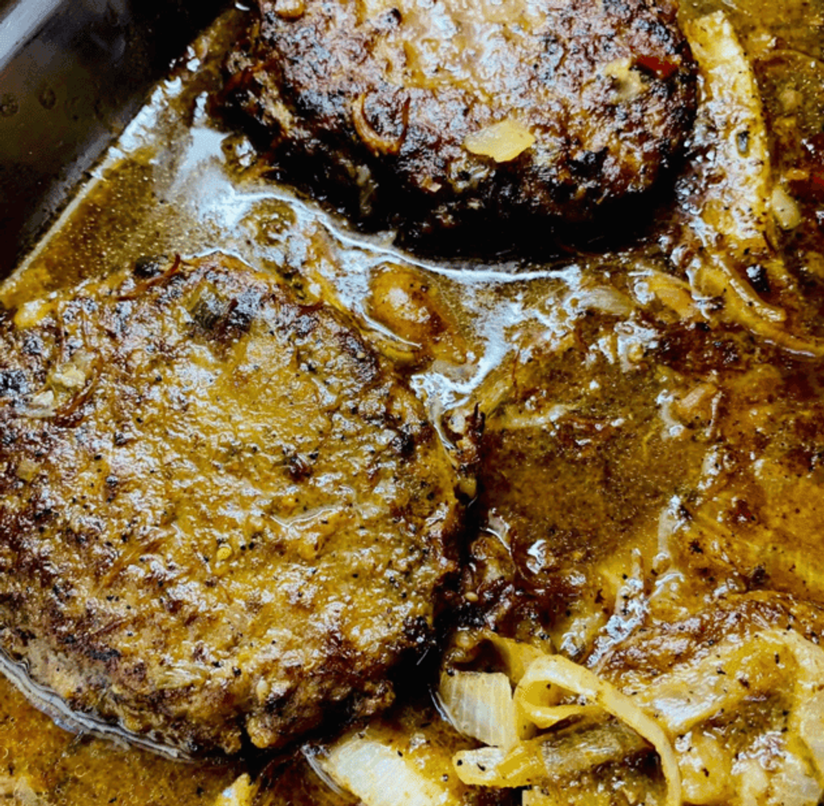 Zion Delight braised oxtails in rich gravy — soul food Atlanta