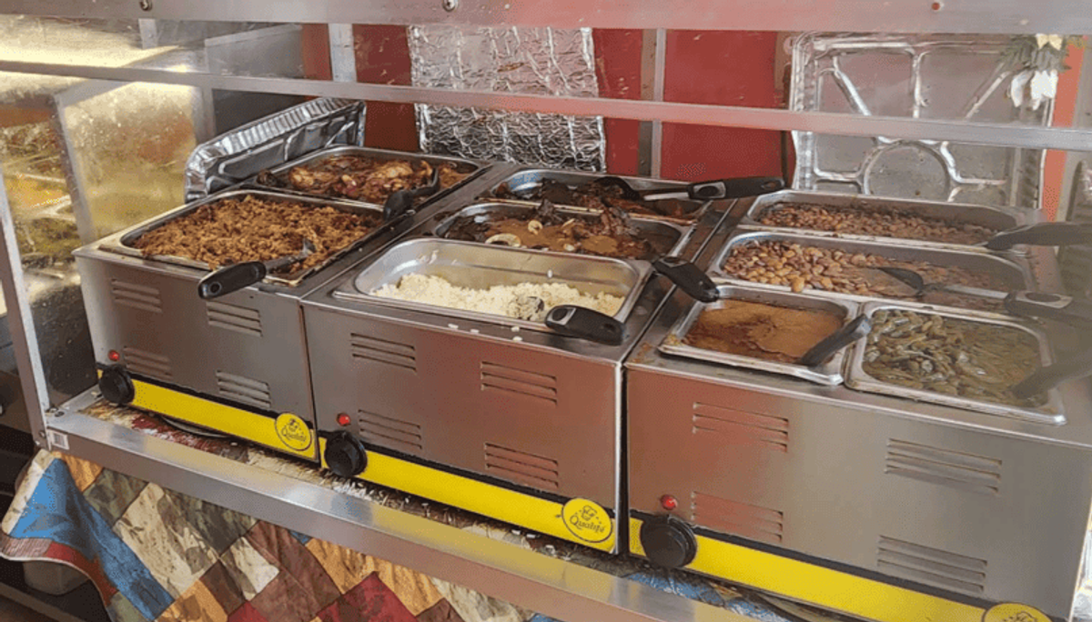 Zion Delight soul food buffet steam line — self-serve restaurant Atlanta